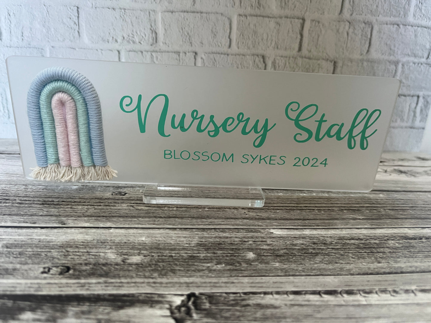 Frosted table top sign with rainbow and stand